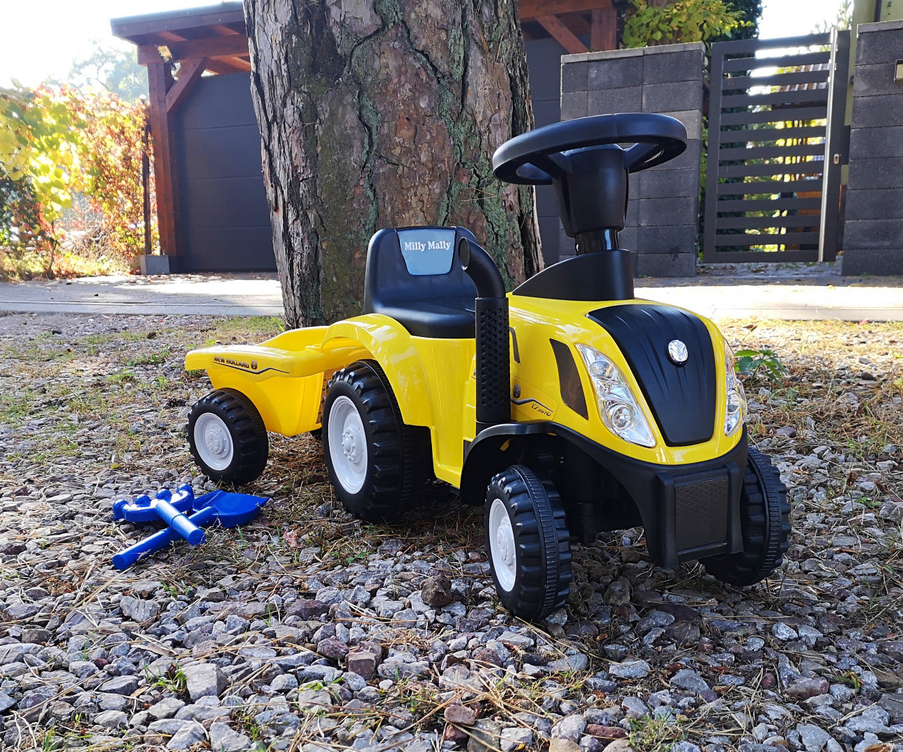 New Holland T7 -traktoripotkuauto peräkärryllä, keltainen, 12–36 kk - Ride-ons - Lasten ajoneuvot